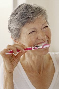 Couple Brushing Teeth