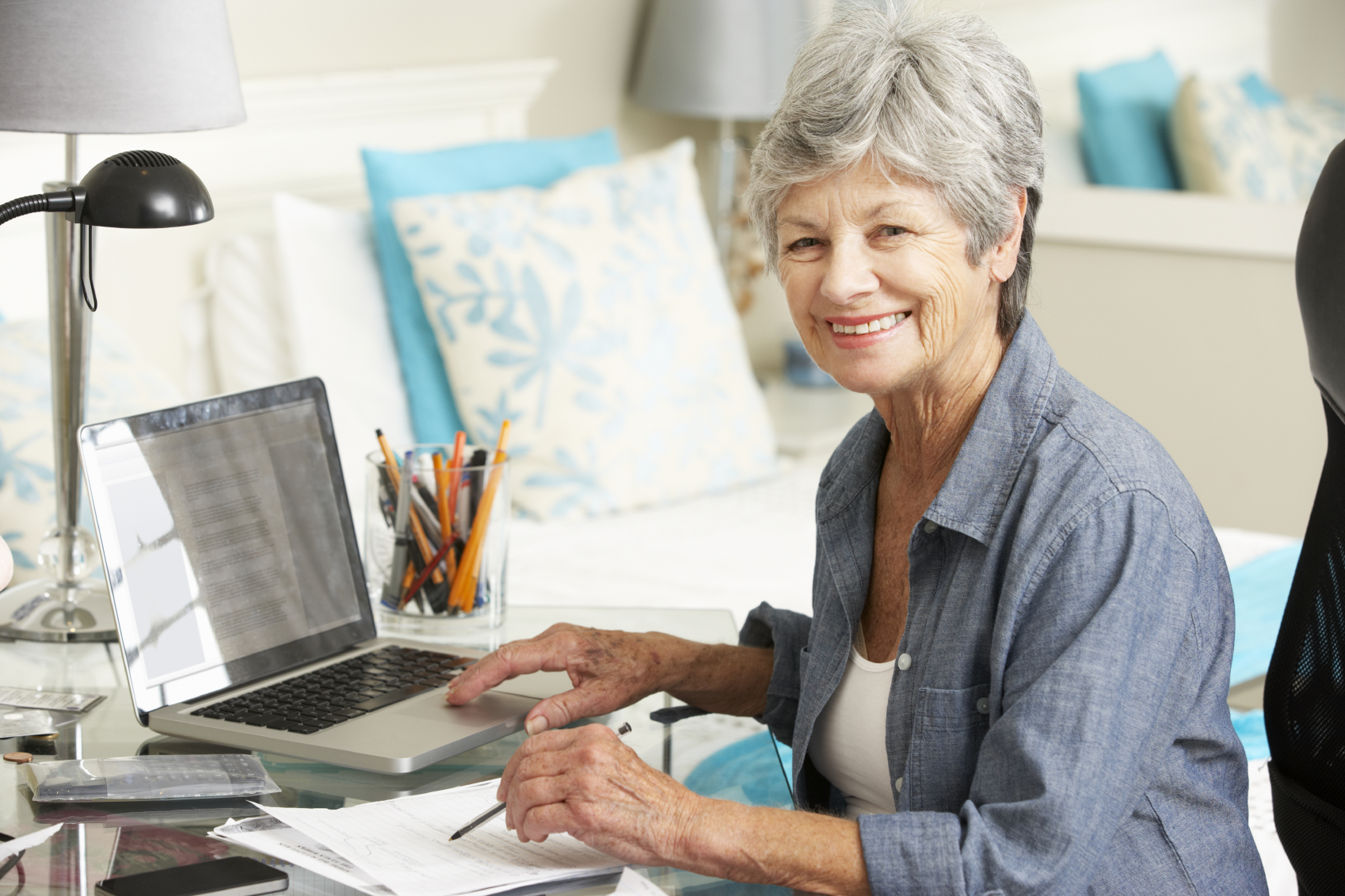 Senior Woman Working In Home Office