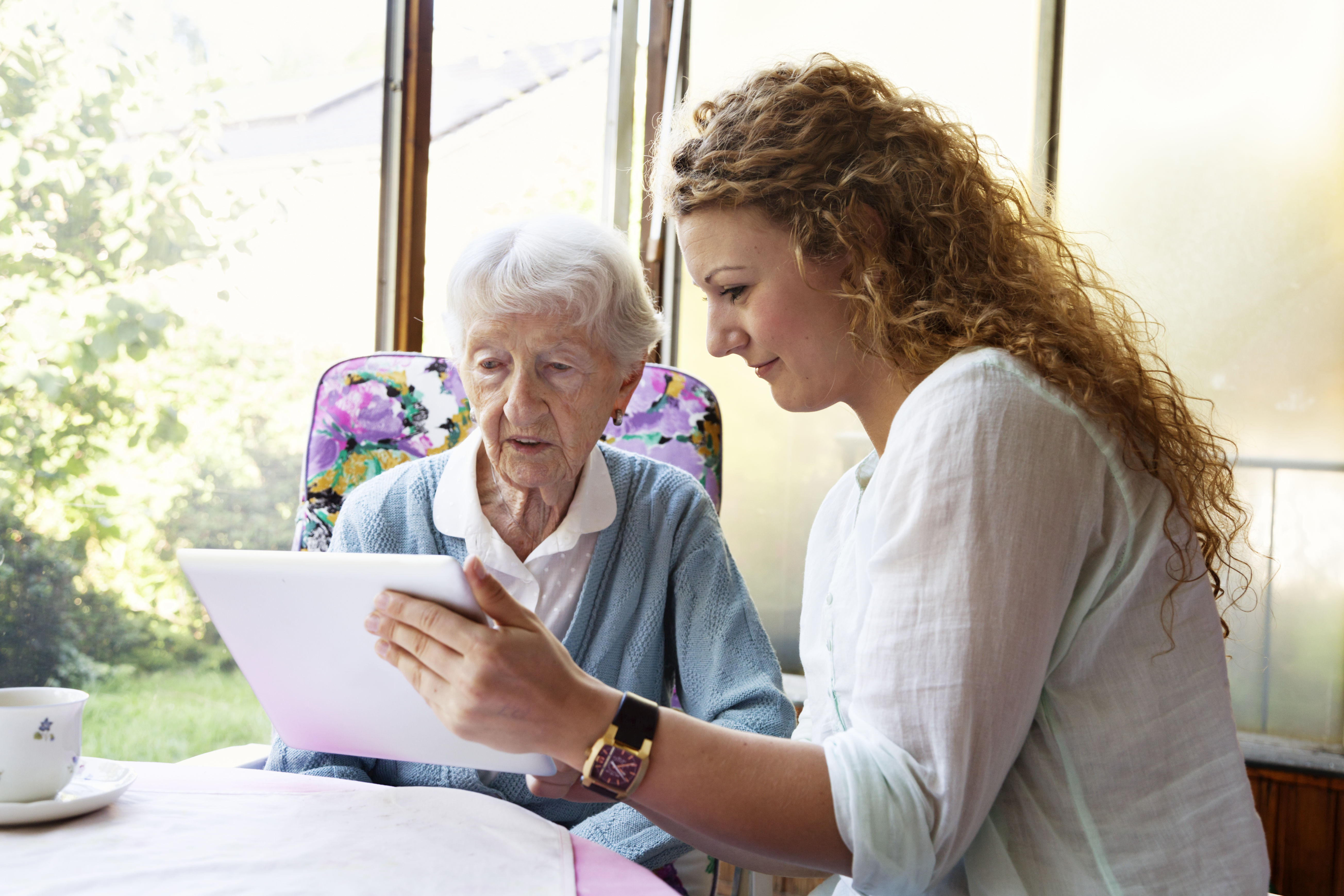 senior woman and digital tablet