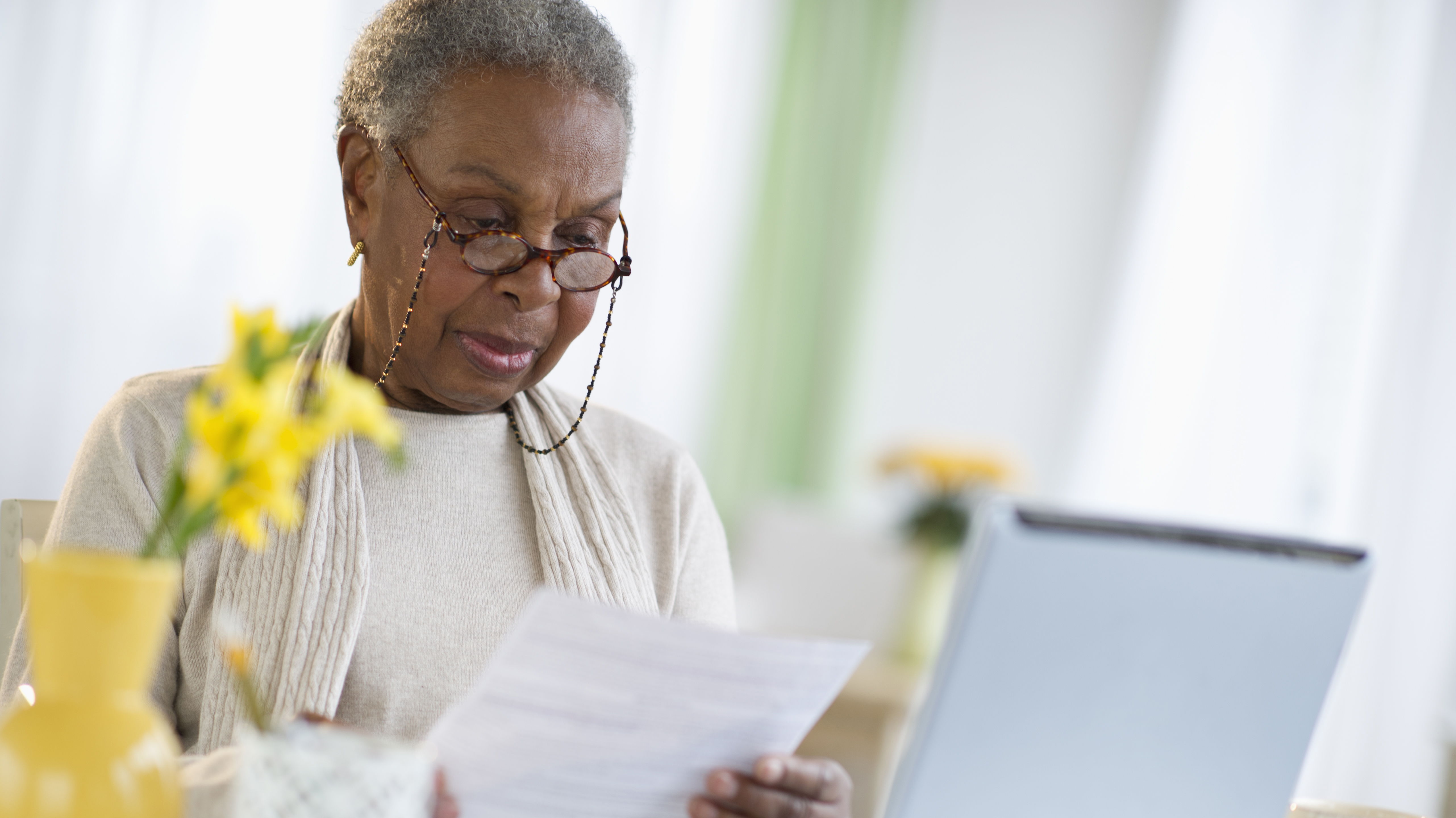 Black woman paying bills online