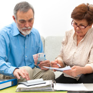 couple calculating home finances