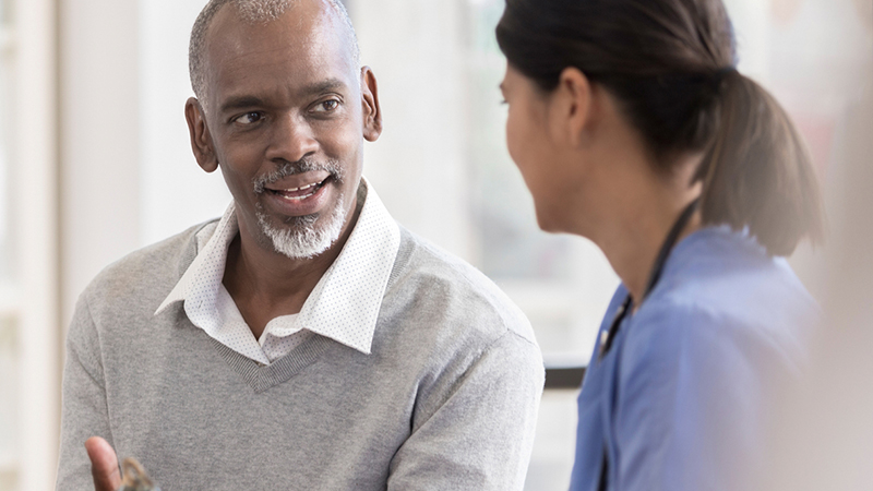 A doctor and patient having a conversation