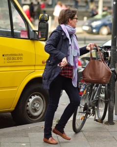 Berlin woman parking a bike