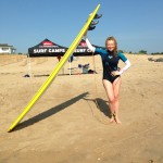 Barbara Hannah Grufferman, posing with surfboard