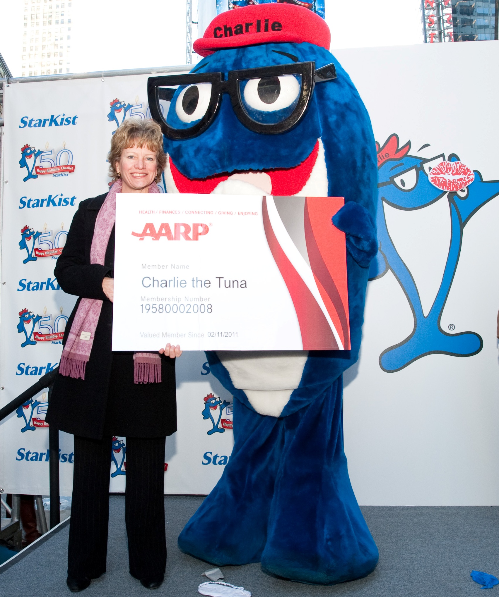 Charlie the Tuna receives his AARP card