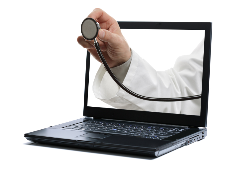 Laptop and doctor with stethoscope