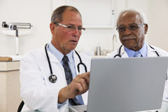 240-two-doctors-computer-electronic-health-records-medical