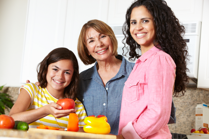 Mother,daughter and grandmother cooking