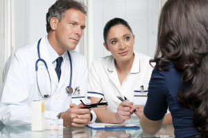 Young female patient discuss with doctors on her medical exam at hospital