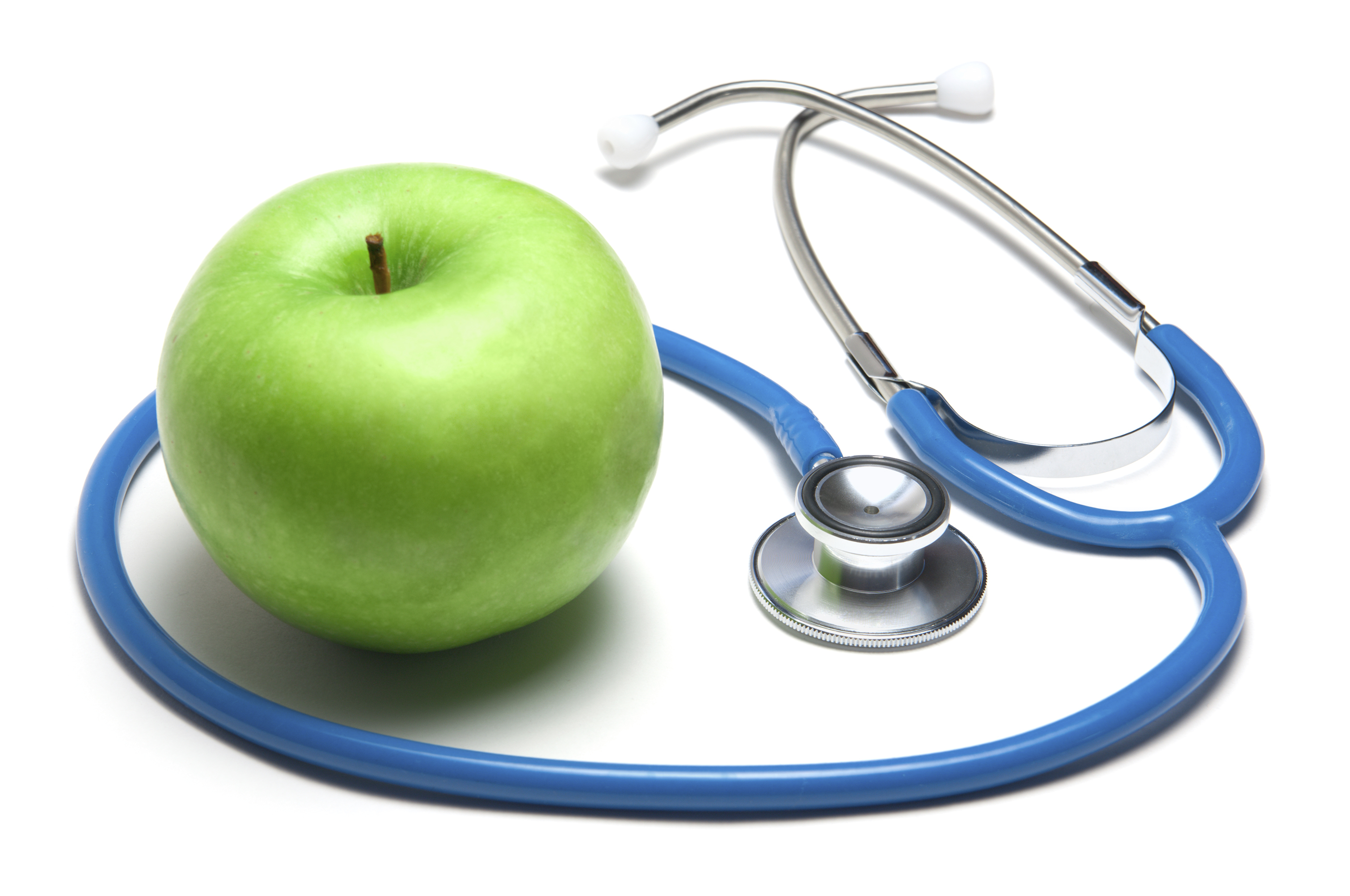 Green apple with stethoscope