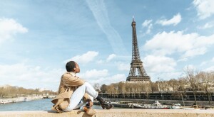 image_of_woman_sitting_gazing_at_Eiffel_tower_GettyImages-1057205524_1800