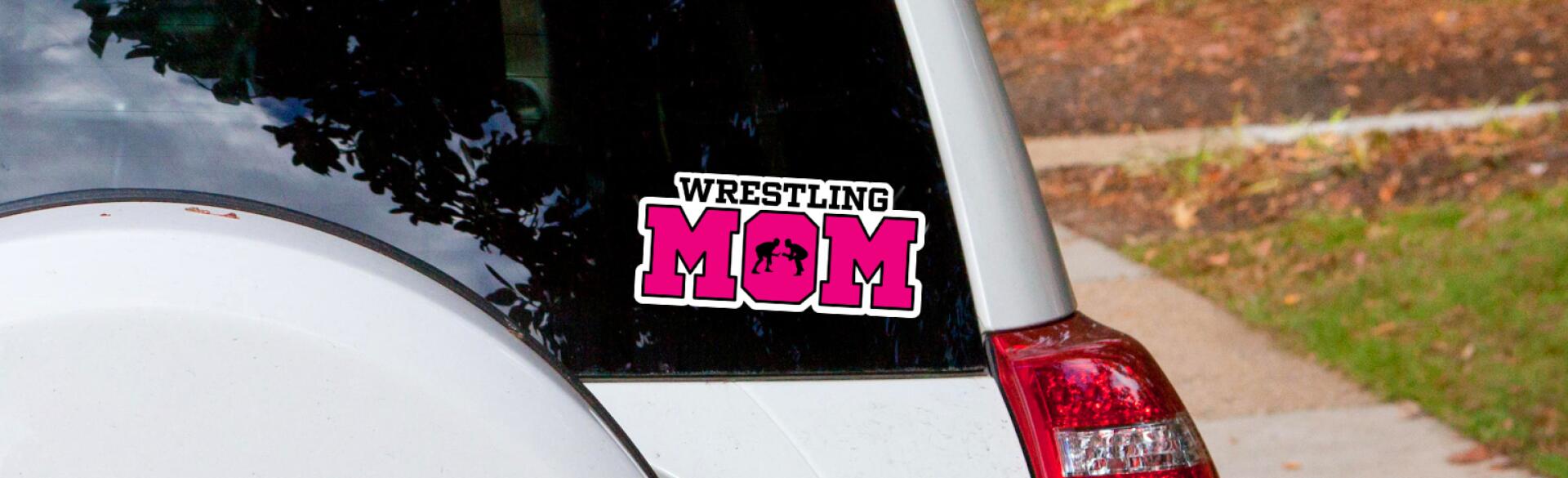 Car with bumper sticker that says wrestling mom