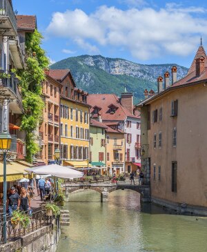 Landscape of Promenade on the Canal de Thiou with the Palais de l'Isle in Annecy, France