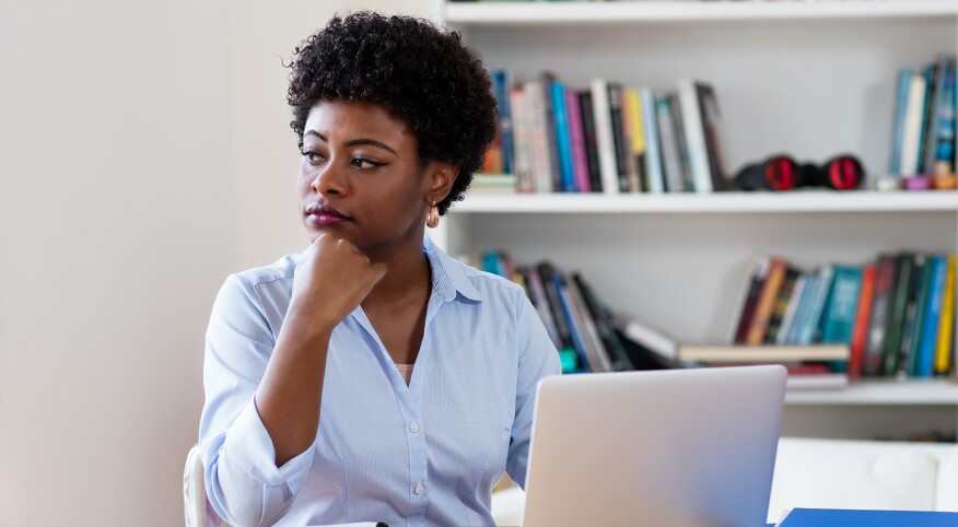 African american businesswoman with depression at work