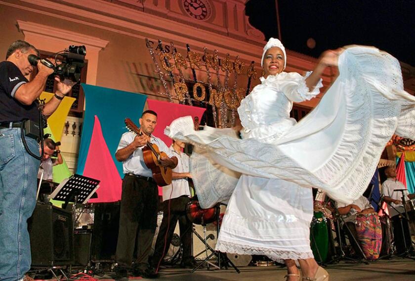Woman dancing during Carnival in Puerto Rico