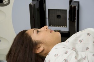 Woman receiving radiation therapy