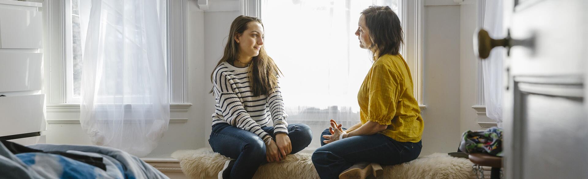 Mother And Daughter Having Private Chat At Home