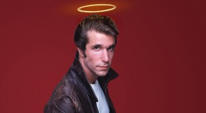 Fonzie from happy days posing with a halo drawn over his head