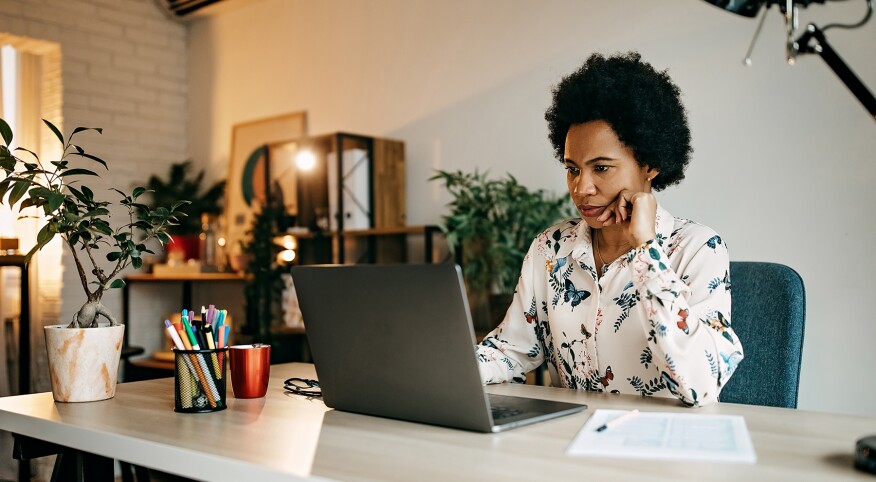 image_of_woman_working_on_computer_GettyImages-1216489414_1800