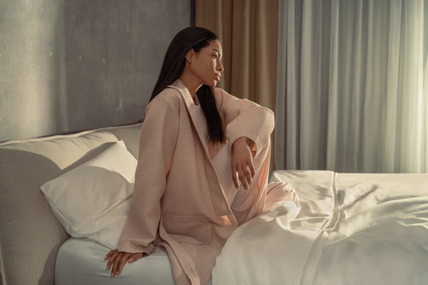 Eight Sleep Pod 5 - Lifestyle - Morning Woman.jpg
