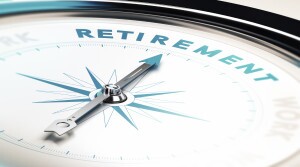 Compass with needle pointing the word retirement, concept image to illustrate retirement planning