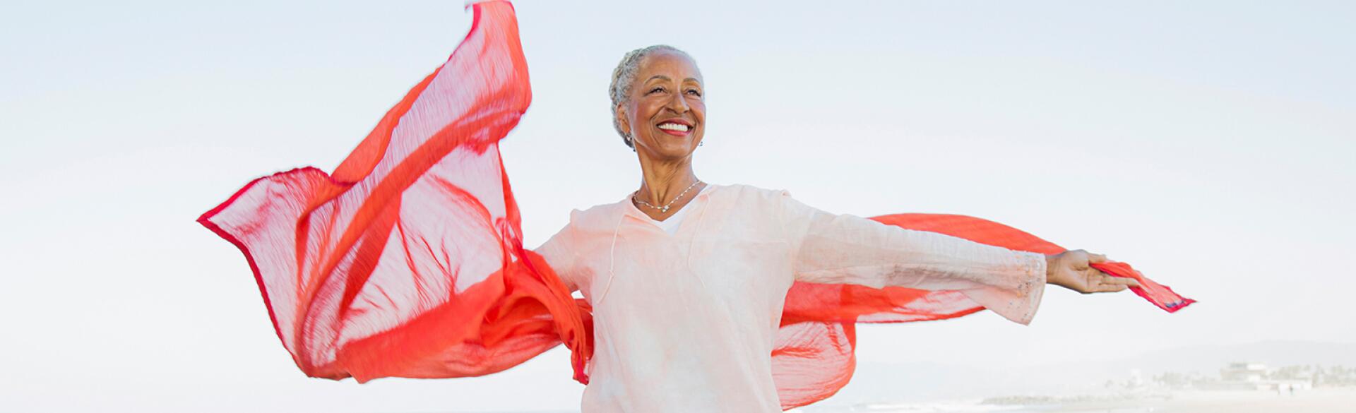 image_of_mature_black_woman_on_beach_GettyImages-905548586_1540.jpg