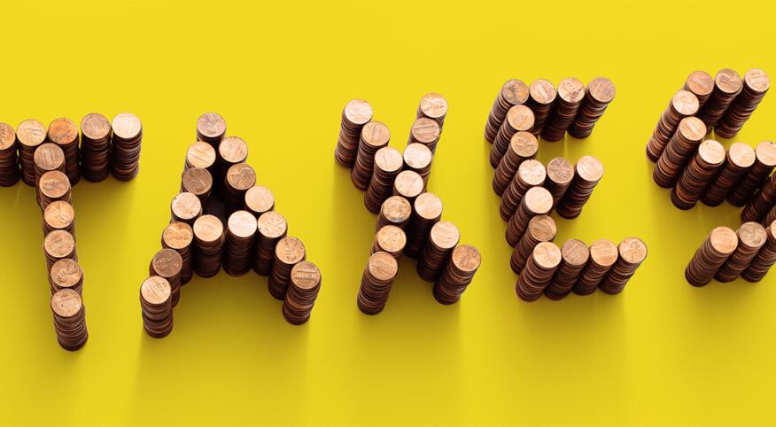 image_of_pennies_forming_the_word_taxes_1540x600