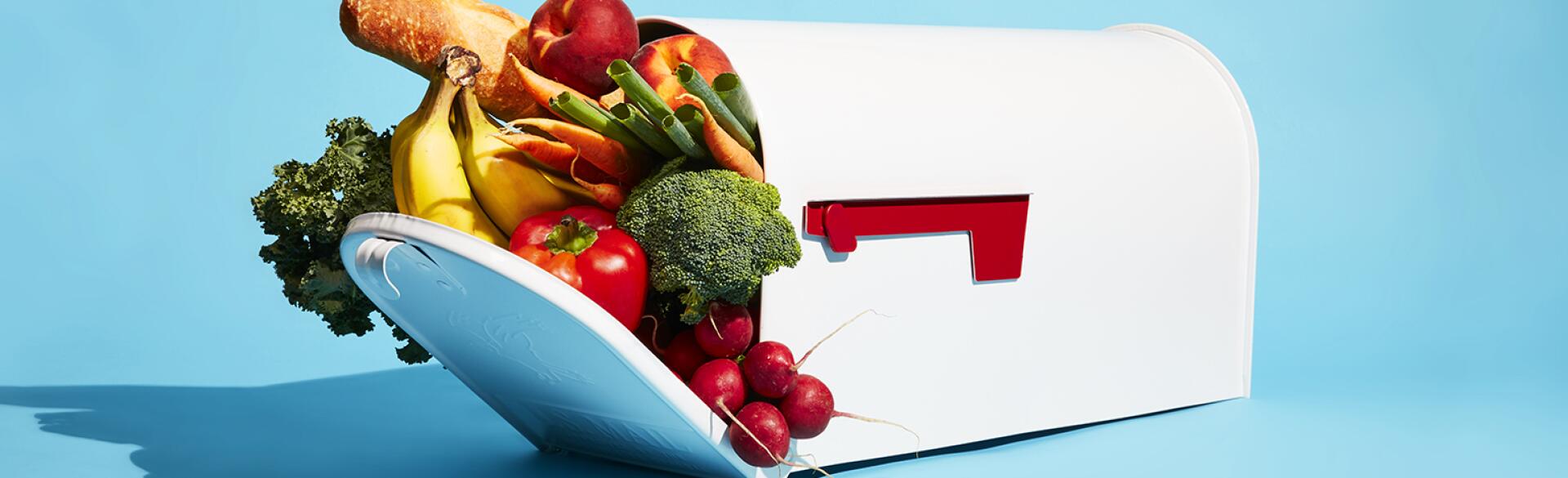 mailbox filled with various food