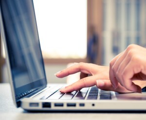 Woman using laptop