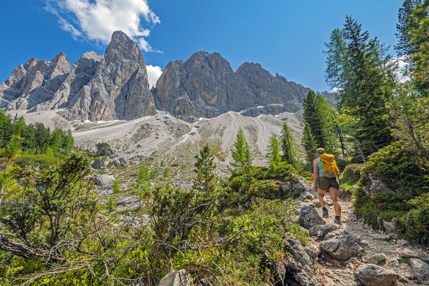 Hiker in Puez-Odle Nature Park (Naturpark Puez Geisler) in South Tyrol