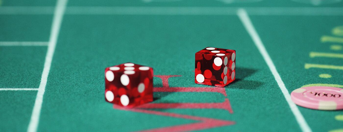 image_of_dice_on_a_gambling_table_GettyImages-6427-000194_1800