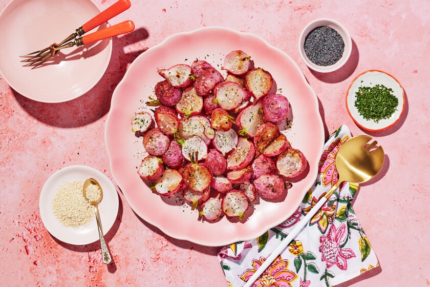 Roasted Radishes on a pink plate with pink surrounding elements