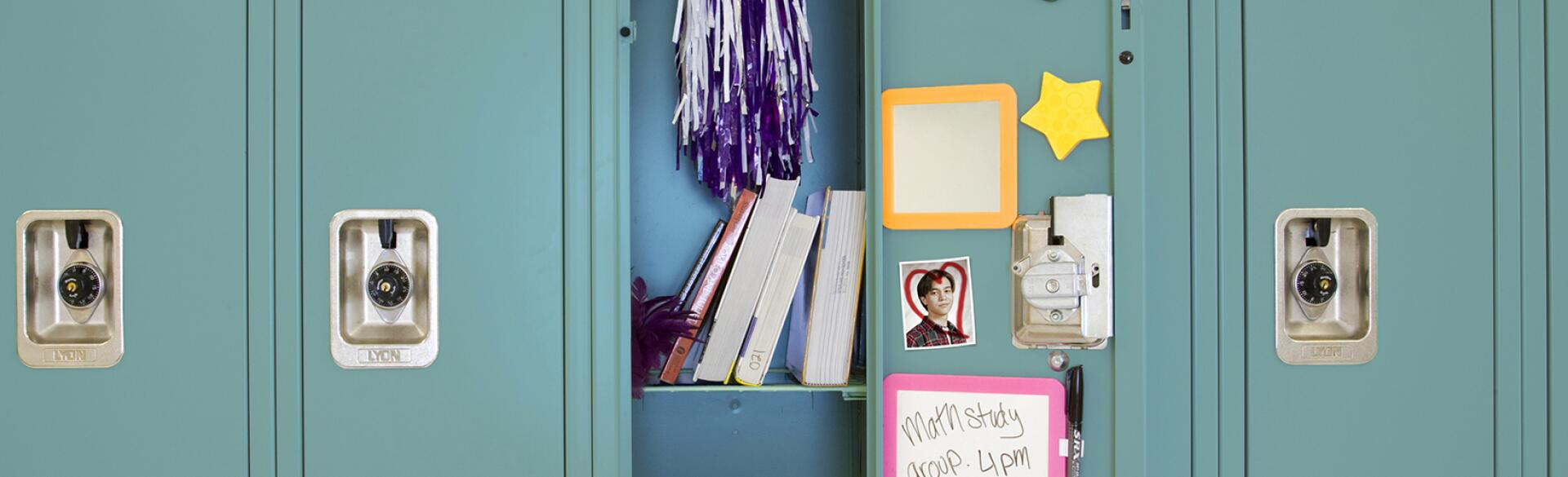 An image of an open high school locker.