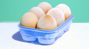 An image of six eggs in a carton.