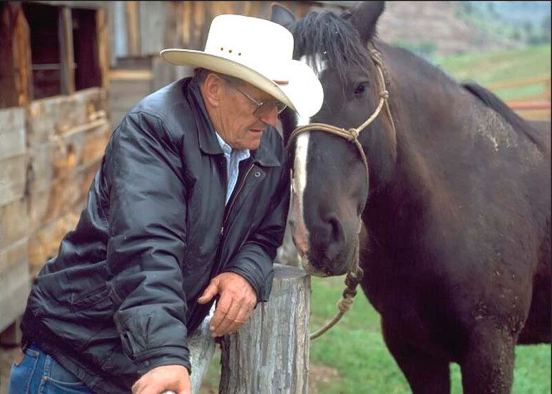 DaytonHyde leaning into horse