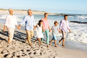 Family walking on beach