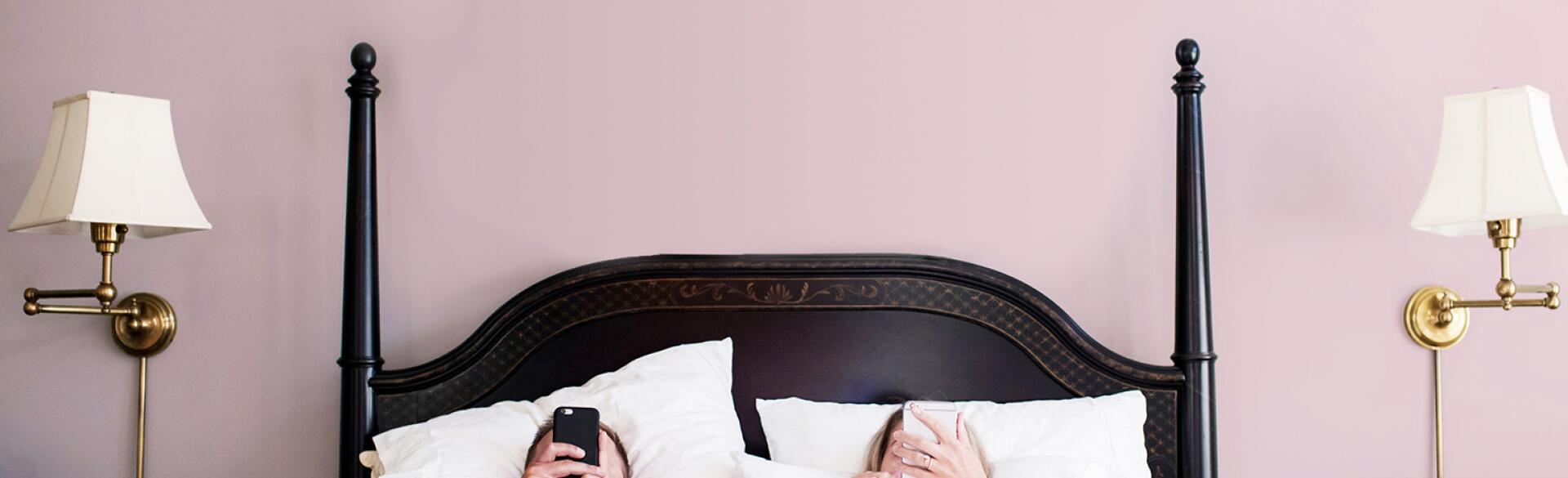 On The Morning Of A 40th Birthday, A Couple Unenthusiastically Check Their Phones