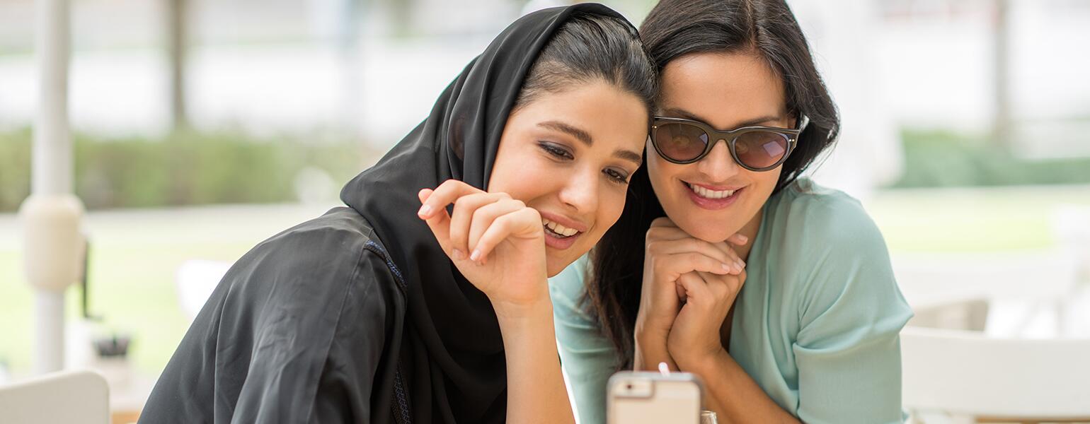 A picture of two sisters next to each other.