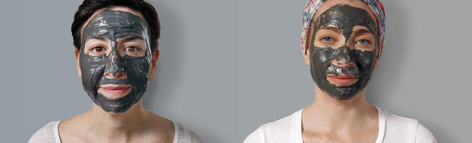 two women with magnetic face masks on