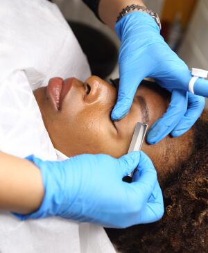 image_of_woman_recieving_microblading_shutterstock_1165820410_1800