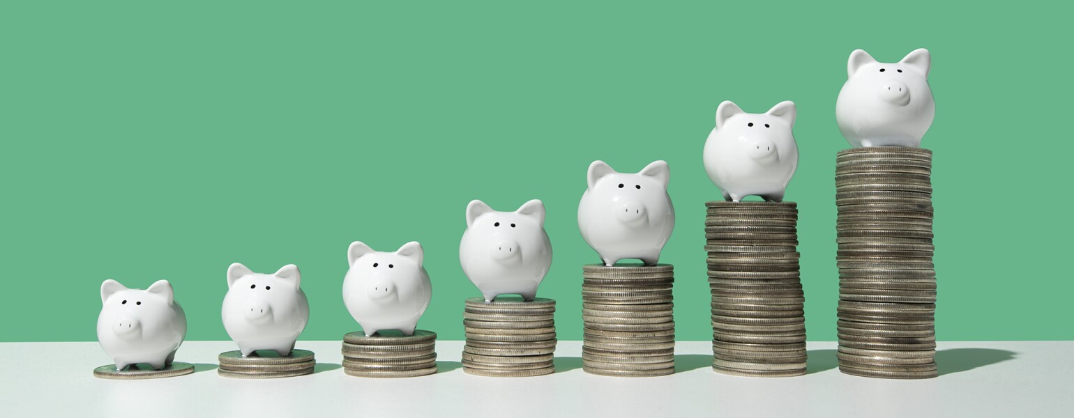 Little piggy banks on ascending stacks of coins Jean Chatzy how to save enough for retirement