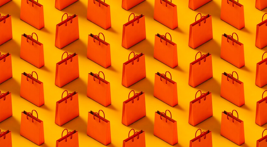 Pattern of red-orange shopping bag on a yellow background