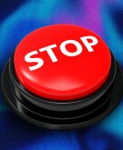 photo of stop push button against blue and purple gradient background
