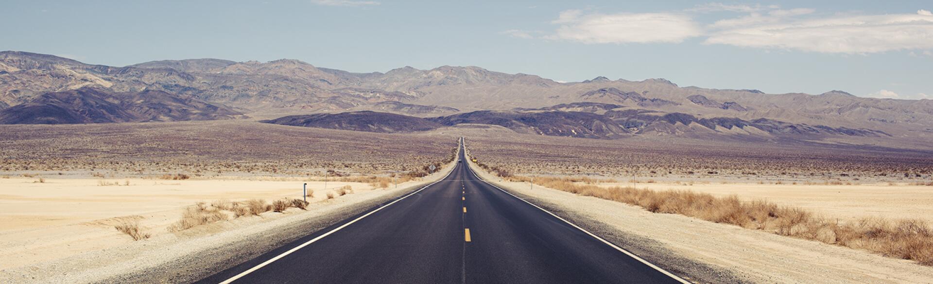 Empty road in the desert representing loneliness.