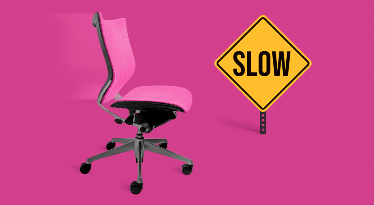 Pink chair and slow sign, pink background