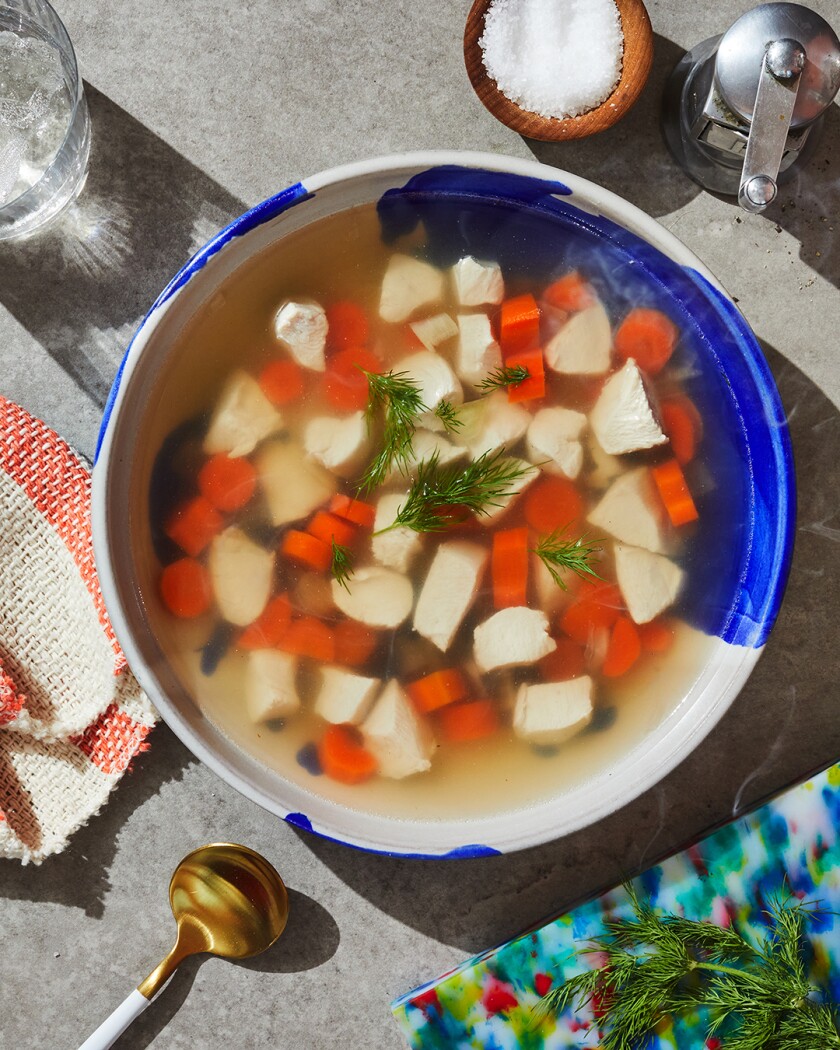 Chicken soup on a decorated table