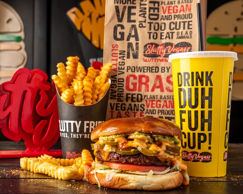 Vegan burger and french fries with fountain drink