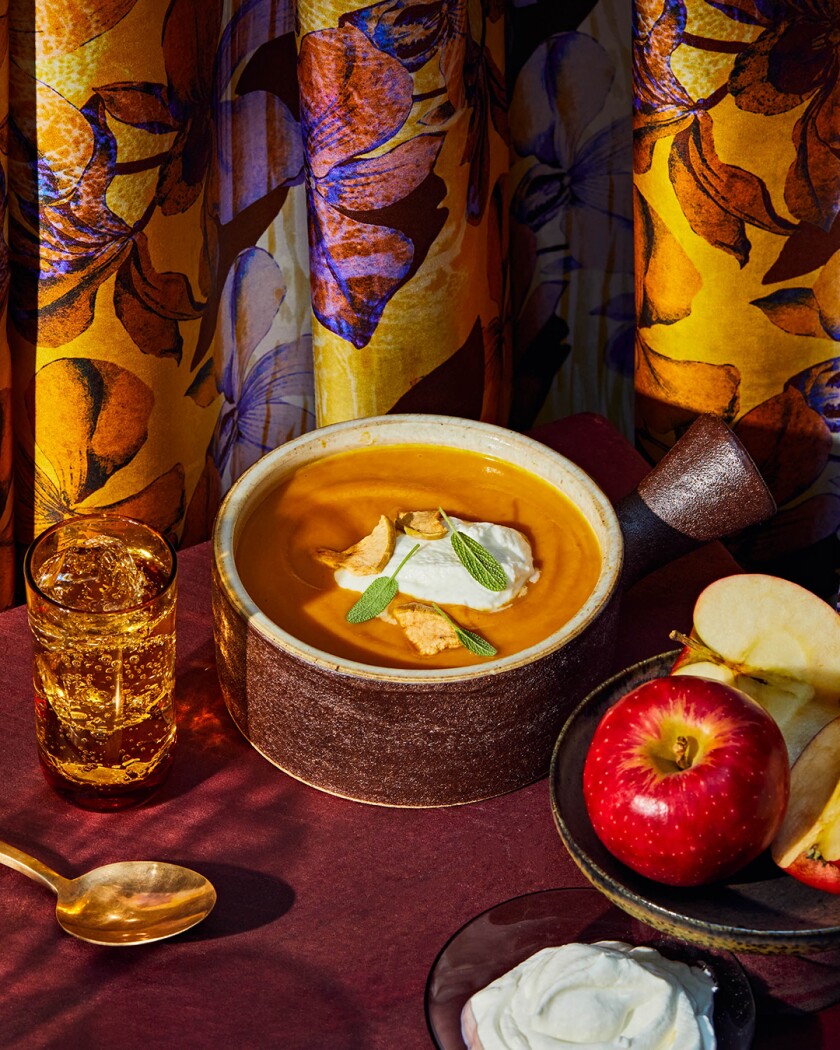 Soup styled on table with autumn decor