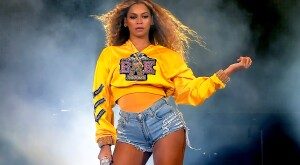 Beyonce performing at Coachella wearing college sweatshirt