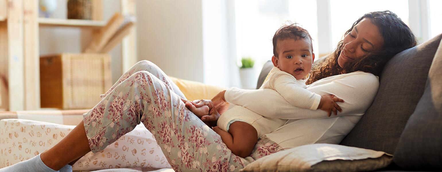 image_of_mother_holding_baby_GettyImages-1152209557_1540.jpg